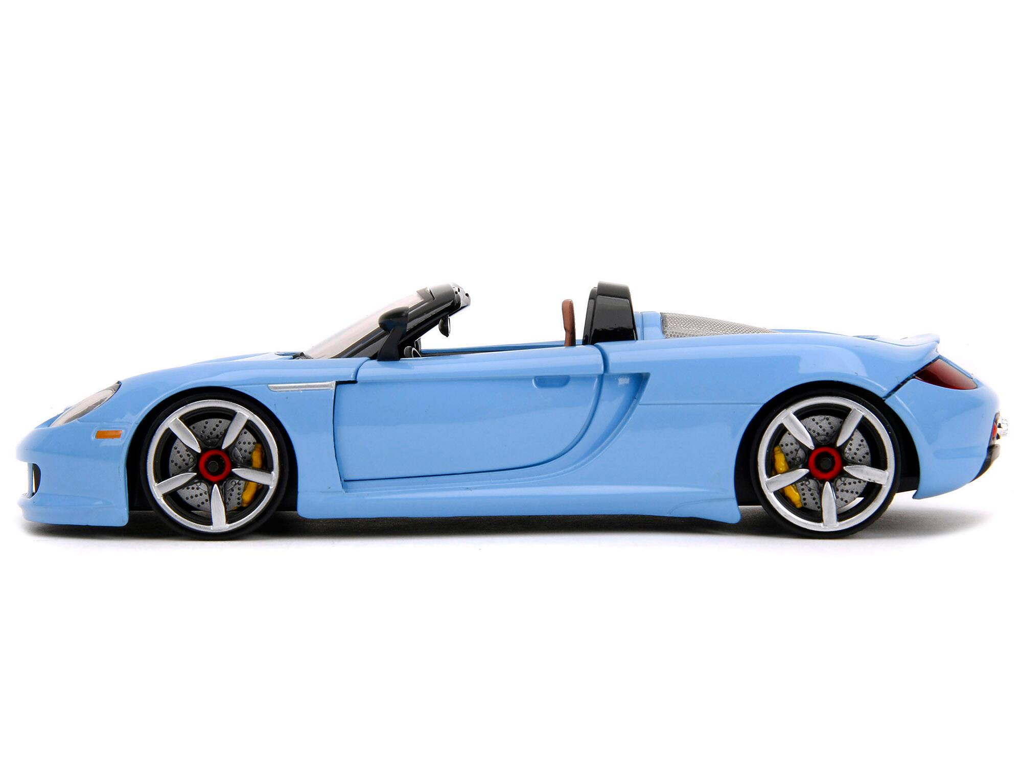 Alt View 3. Jada - Porsche Carrera GT Convertible Blue with Black Stripes "Pink Slips" Series 1/24 Diecast Model Car by Jada.