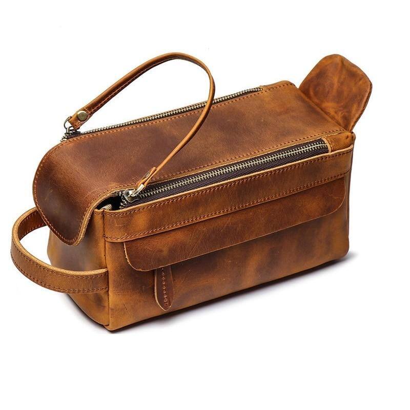 Left. Steel Horse Leather - Dado Leather Dopp Kit | Handmade Leather Toiletry Bag - Brown.
