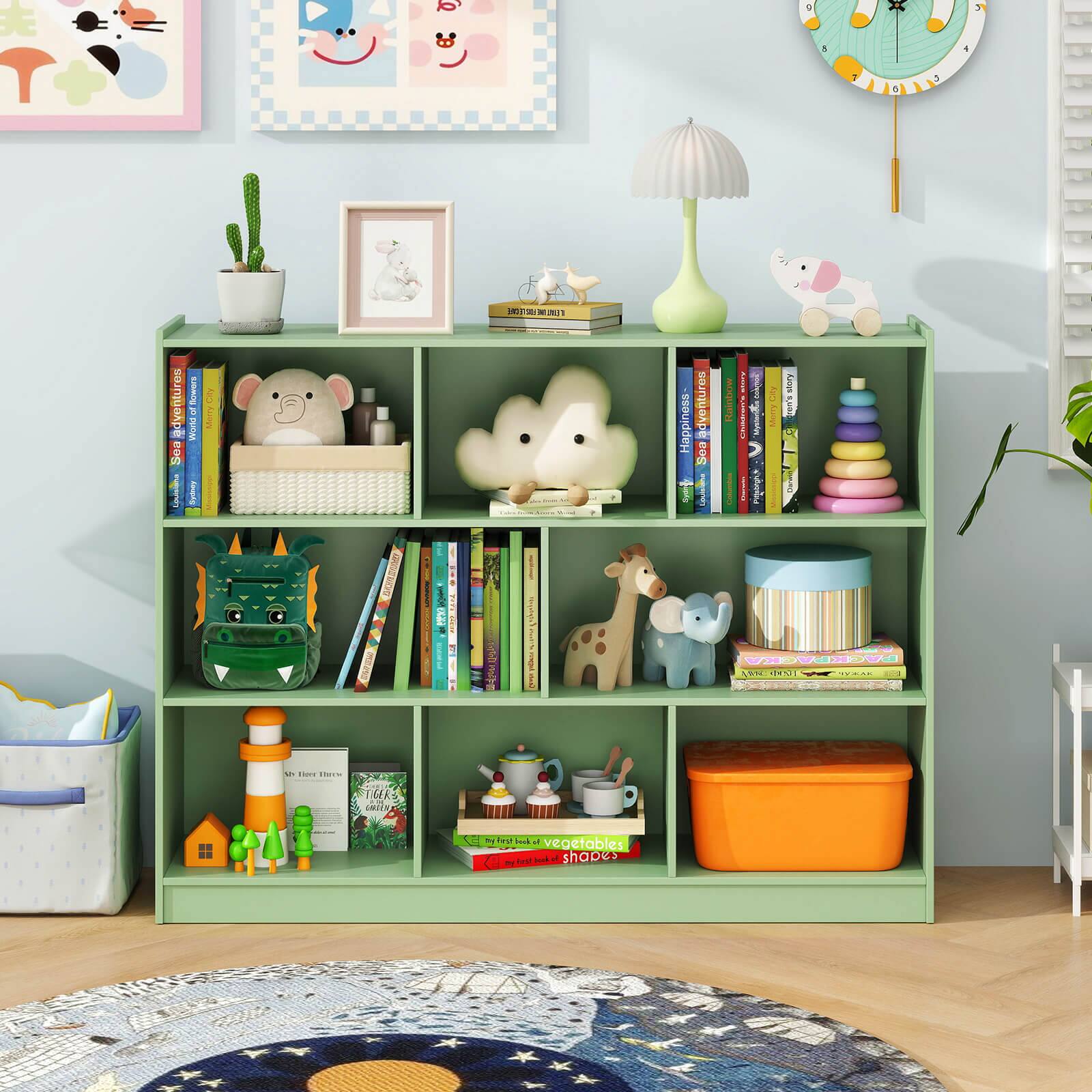 A green bookshelf filled with books, toys, and decorations. The books are arranged on the shelves, with some placed horizontally and others vertically. The toys include a stuffed giraffe and a stuffed dragon, adding a playful touch to the bookshelf. The decorations include a clock hanging above the bookshelf and a potted plant nearby. The bookshelf is situated in a room with a hardwood floor, creating a cozy and inviting atmosphere.