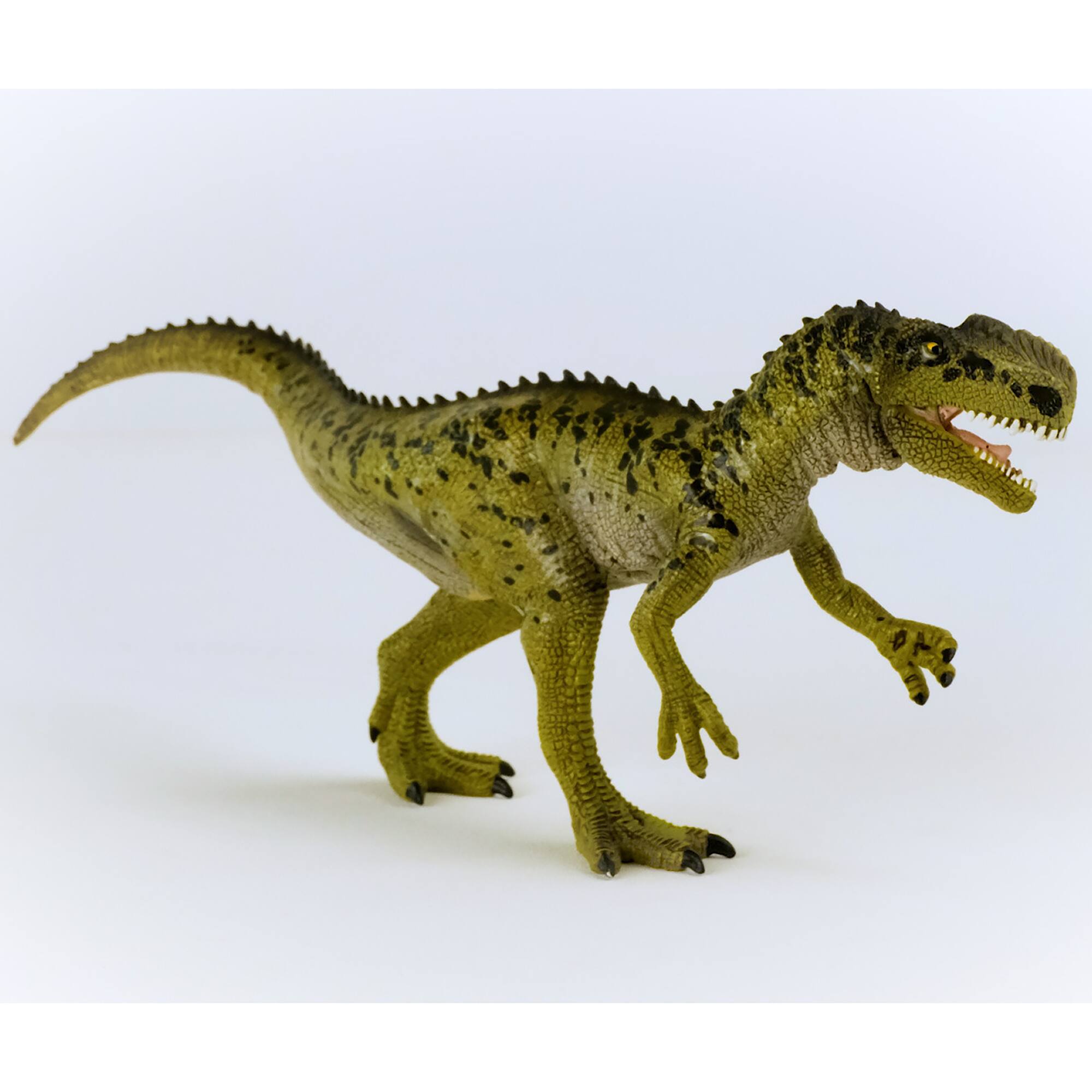 Left. Schleich - Dinosaurs: Monolophosaurus.
