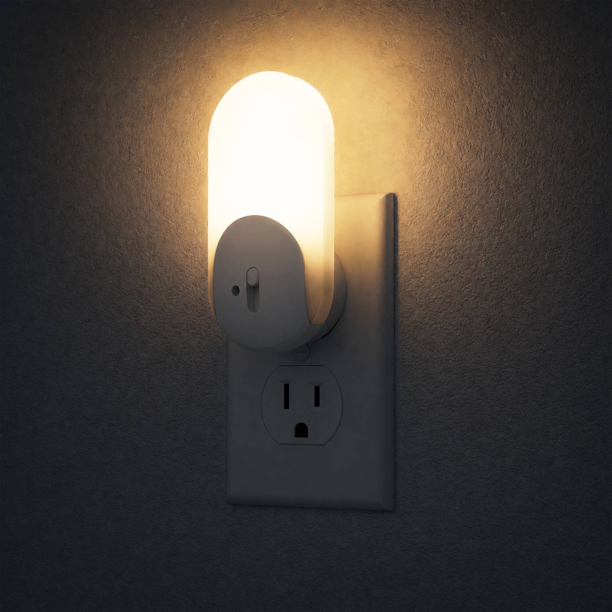 Left. Jandcase - JANDCASE 2-Pack 0.3W  Plug-in Night Light, 3000K Warm Glow, Oval/Racetrack Design,  10-100%, Dusk-to-Dawn Sensor - White.