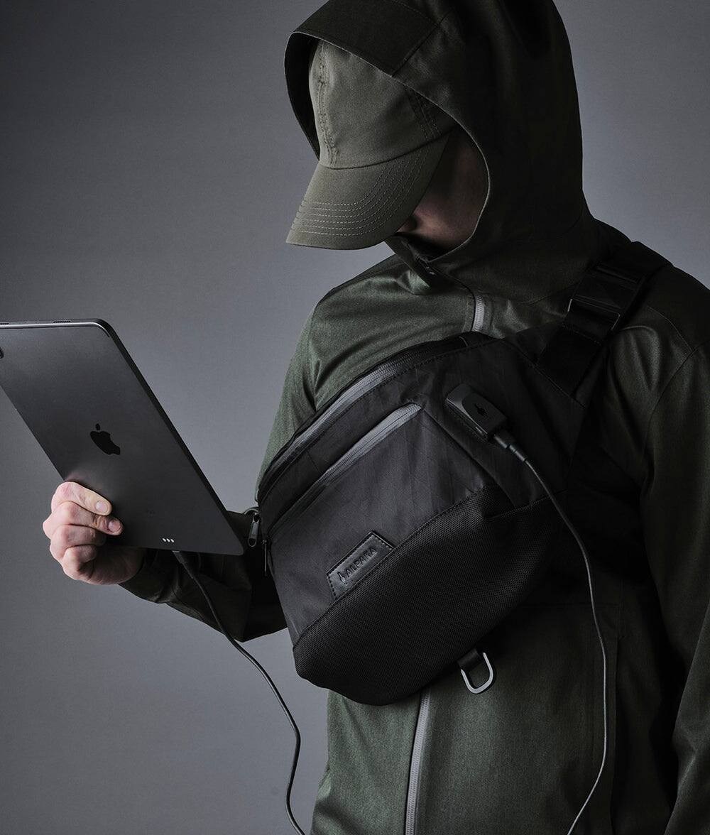 Angle. ALPAKA - Bravo X Sling V2 6L Tech Sling Bag for 11-inch iPad Pro, USB Charging Crossbody Bag with RFID Pocket, Weather-Resistant - Black X-Pac VX42.