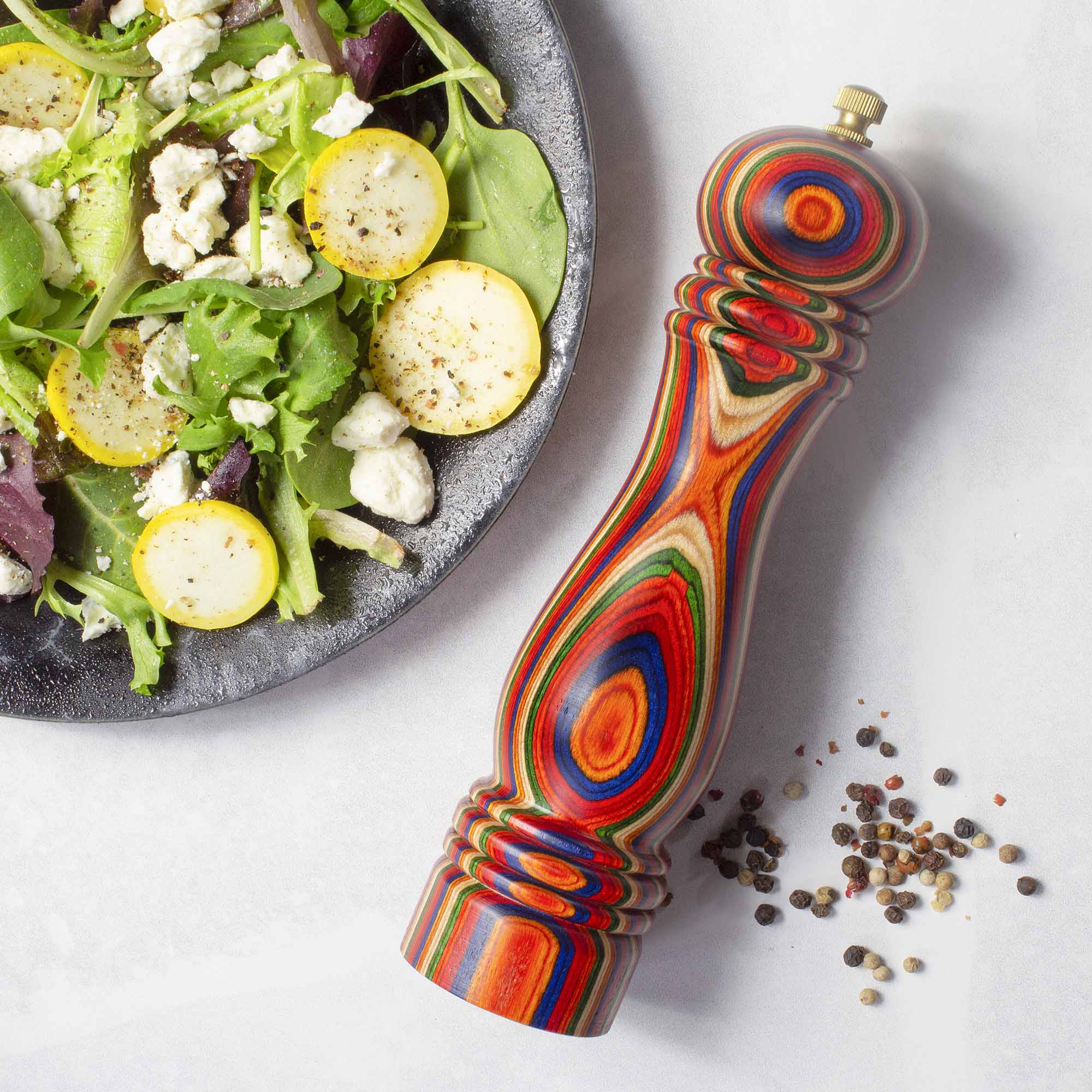 Left. Baltique - Marrakesh Collection Refillable Pepper Grinder - Red, Blue, Green, Orange.