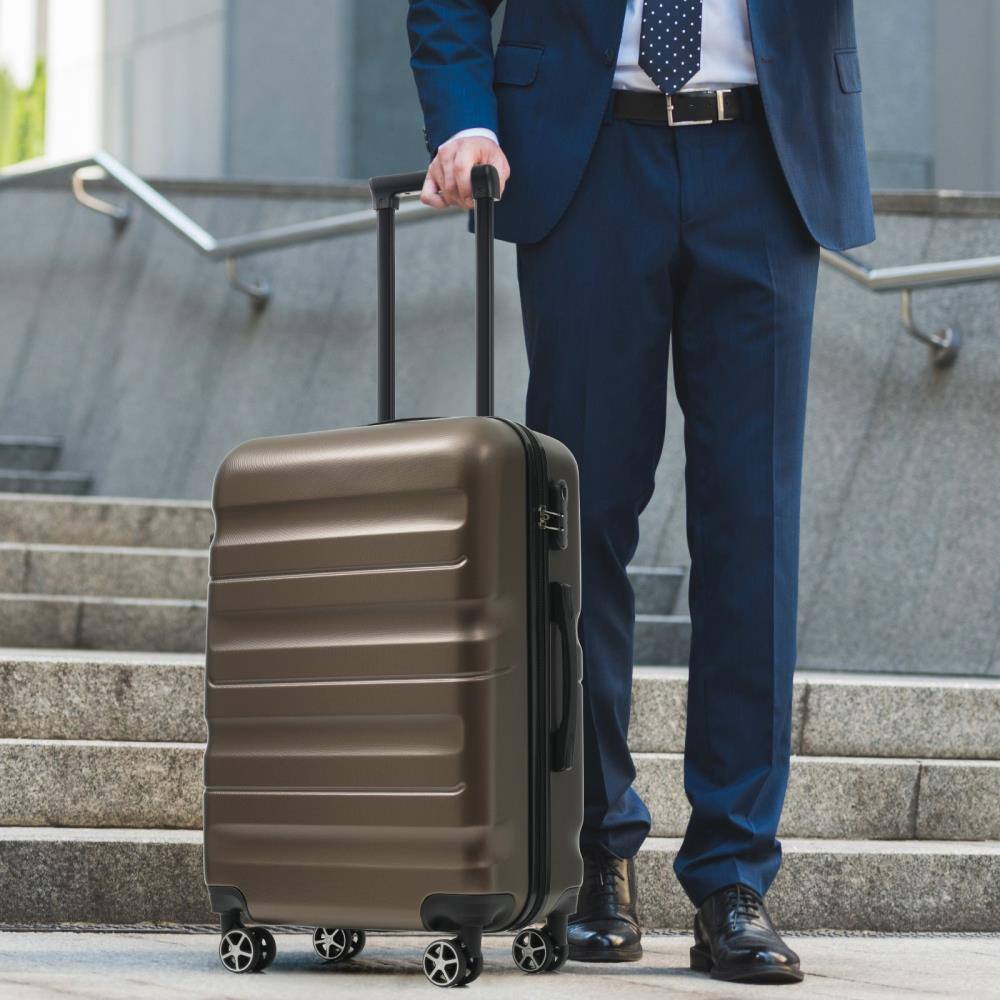 Angle. BreeBe - 28-Inch Hardshell ABS Checked Luggage, Lightweight Suitcase with Spinner Wheels for Travel - Brown.