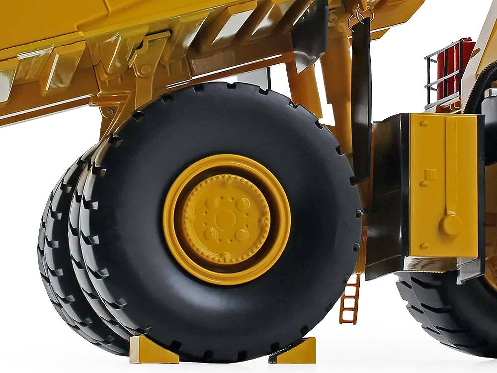 Angle. First Gear - Komatsu 980E-AT Dump Truck 1/50 Diecast Model by First Gear - Yellow .