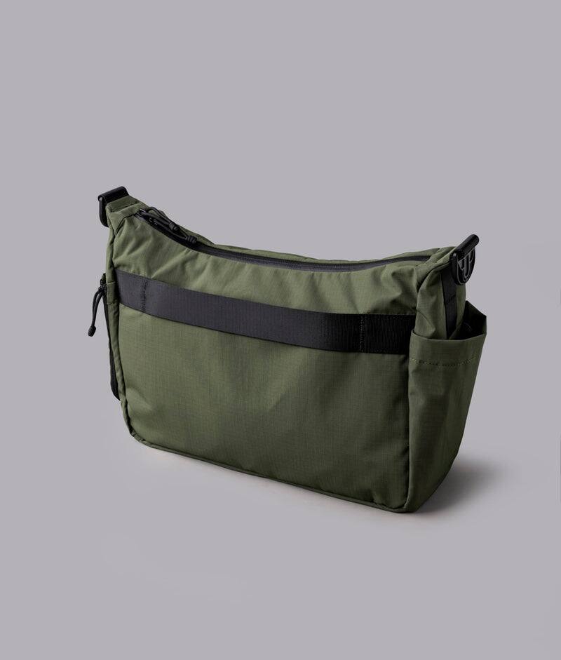 Back. ALPAKA - Laptop Messenger Satchel Bag 11L for Work & Travel, Fits 13" MacBook Air, Bottle Pockets, Luggage Pass-Through - Green Axoflux 210D.