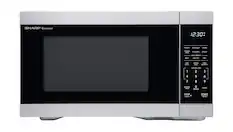 SHARP Carousel
12:30
POTATO
BEVERAGE
VEGGIE
FROZEN
POPCORN
RHEAT
PIZZA
AUTO DEFROST
MEAT
POULTRY
FISH
TIME
COOK
POWER
TIME LEVEL
DEFROST
1
2
3
4
5
6
7
8
9
KITCHEN
0
TIMER
UNLOCK
CLOCK
STOP
CLEAR
START
30 SEC