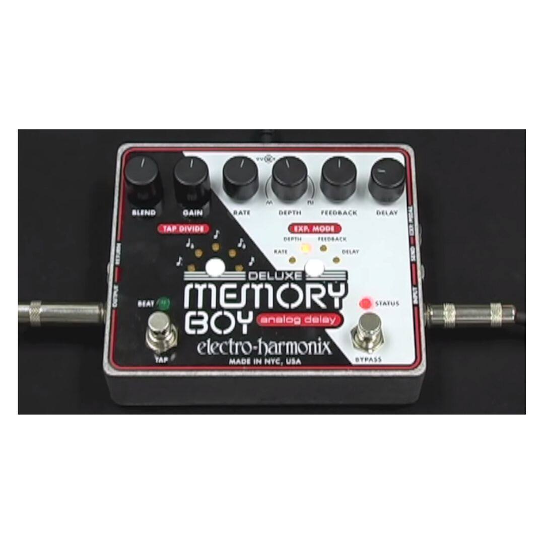 I BLEND GAIN BATE M PU DEPTH FEEDBACK DELAY TAP DIVIDE J EXA MODE DETH FREDBACK RATE DELAY DELUXE MEMORY STATUS BOY analog delay electro-harmonix TAP MADE IN NYC, USA BYPASS