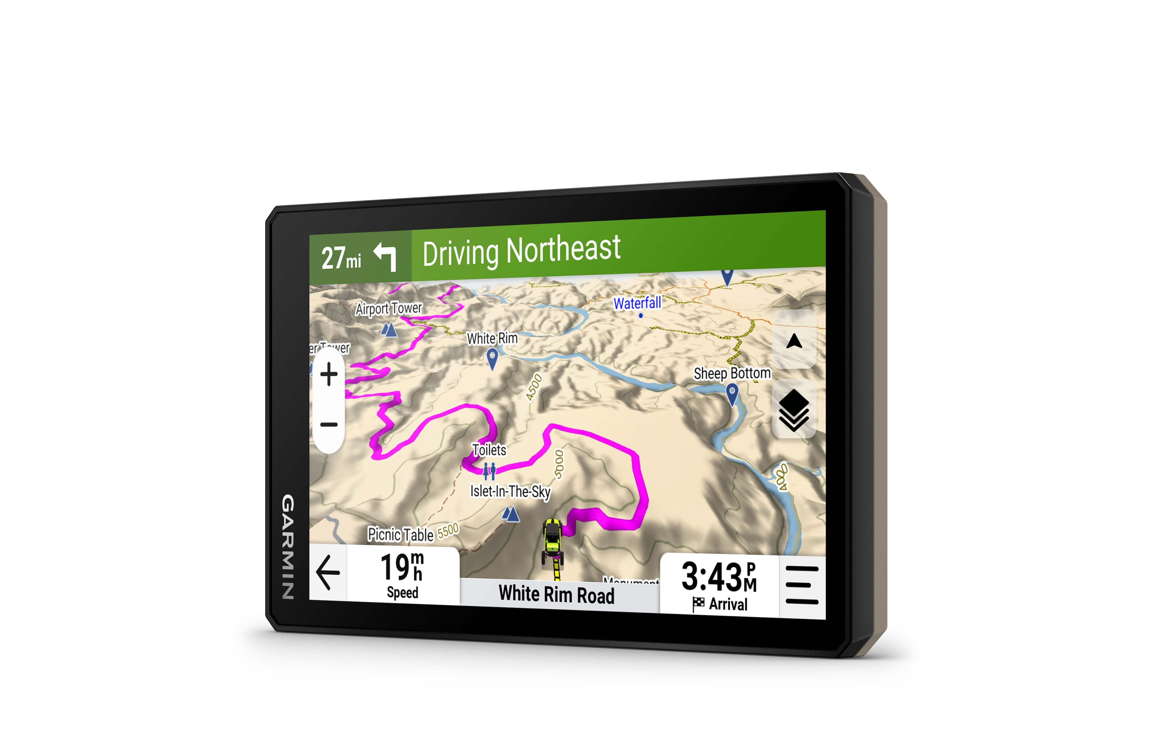 The image shows a Garmin GPS device displaying a route for driving northeast. The route includes a stop at the Tower Waterfall and the Airport, and it is expected to take 3 hours and 43 minutes to complete. The device also shows the current time as 3:43 PM. The route is marked with a purple line, and the device is mounted on a wall.