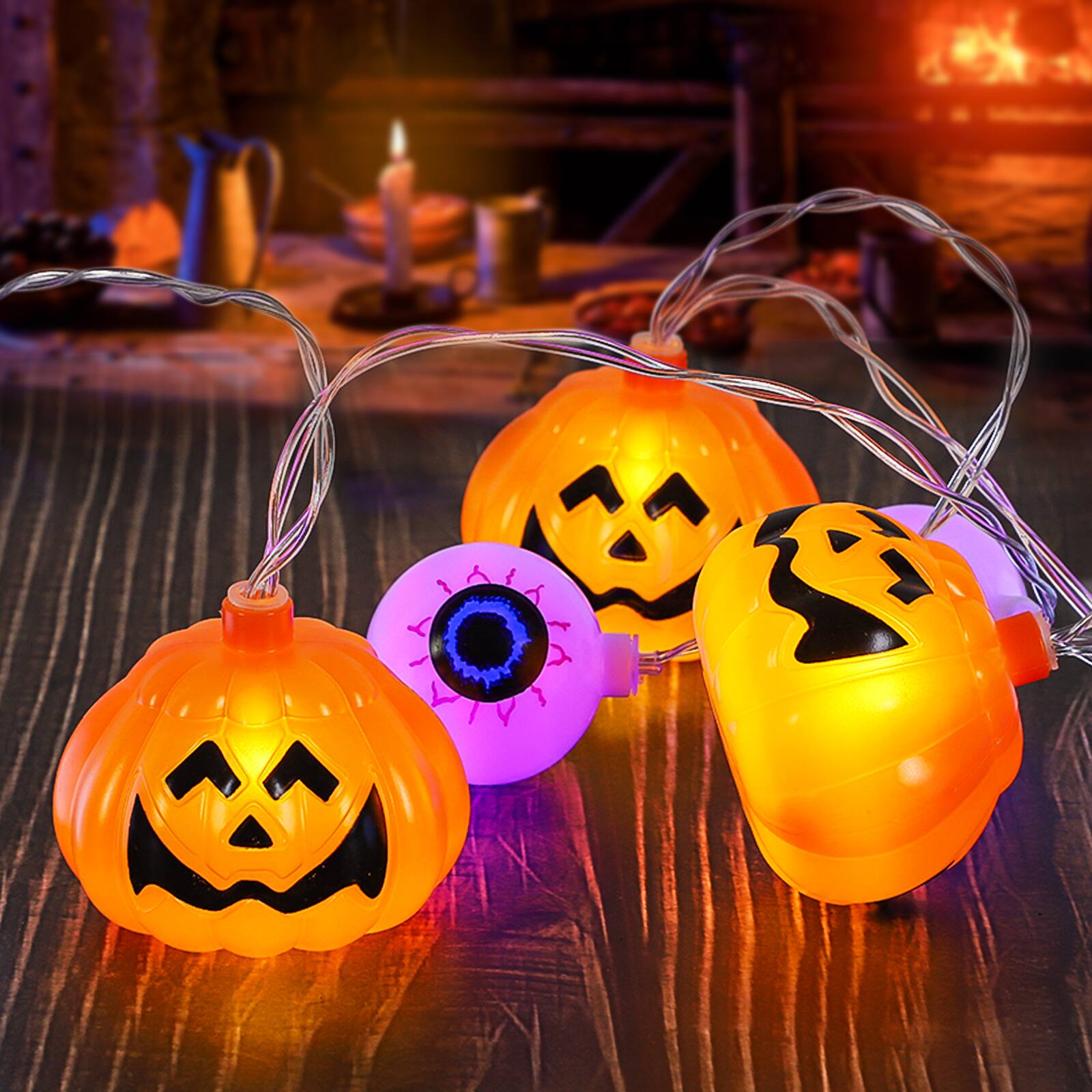 Angle. Oumilen - Halloween String Lights, 2M 10-LED Battery Operated Decorative Lights Pumpkin Skull Eyeball Warm White Purple Party - Multicolor.