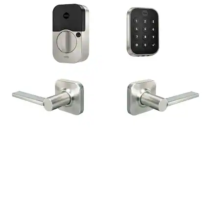 The image features a door handle and a lock, both made by Yale. The handle is silver, and the lock is black. The lock is designed to work with the handle, providing security and convenience for the door. The combination of the handle and lock allows for easy access while ensuring that the door is securely locked.