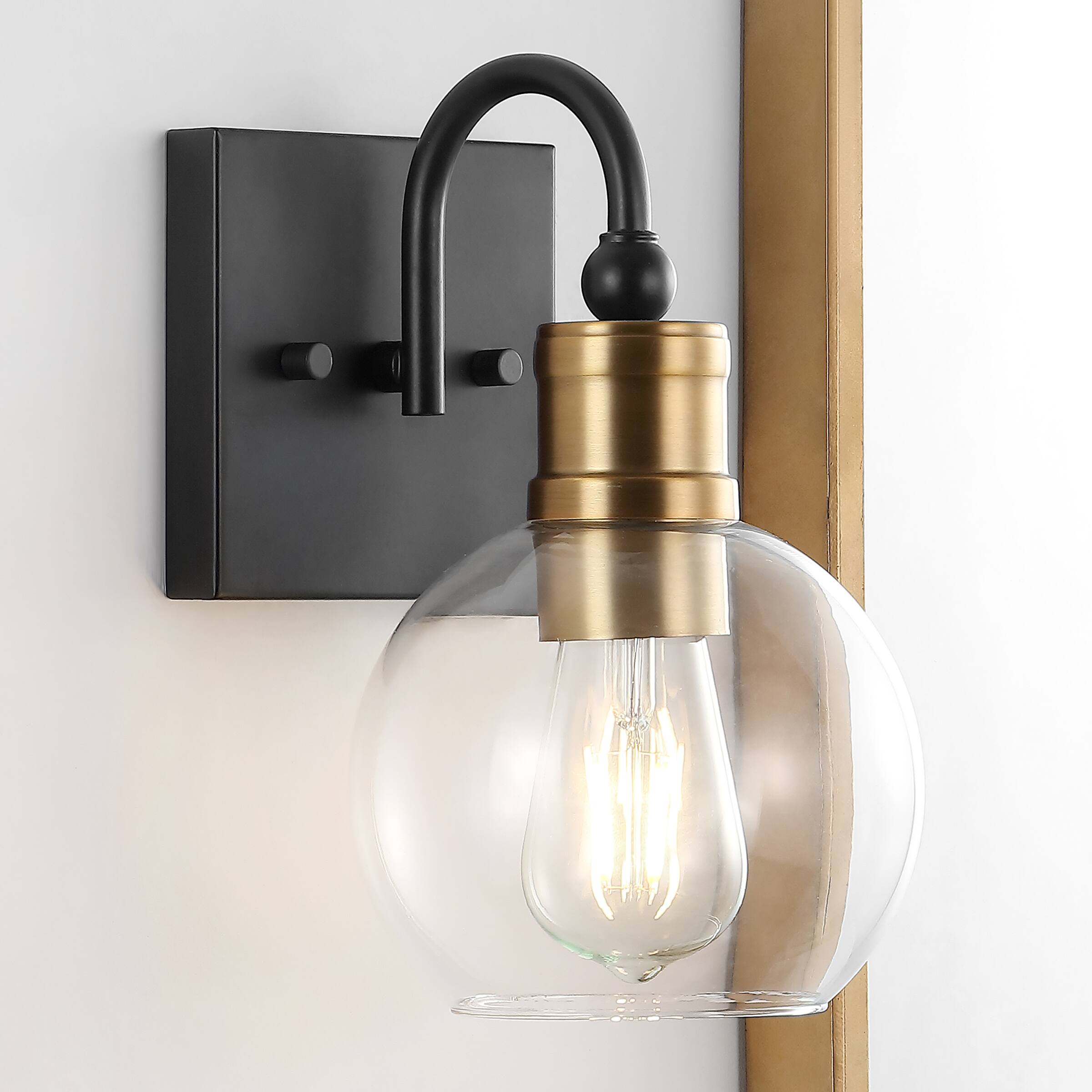 Alt View 1. Jonathan Y - Marais 5.88" 1-Light Iron/Glass Rustic Vintage LED Vanity Light, Black/Brass Gold - Black/Brass Gold.