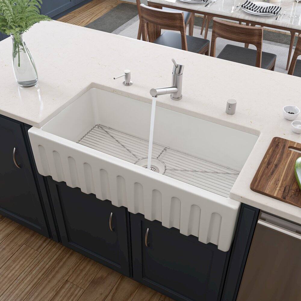 Left. Alfi - 36 inch White Reversible Smooth / Fluted Single Bowl Fireclay Farm Sink - White.