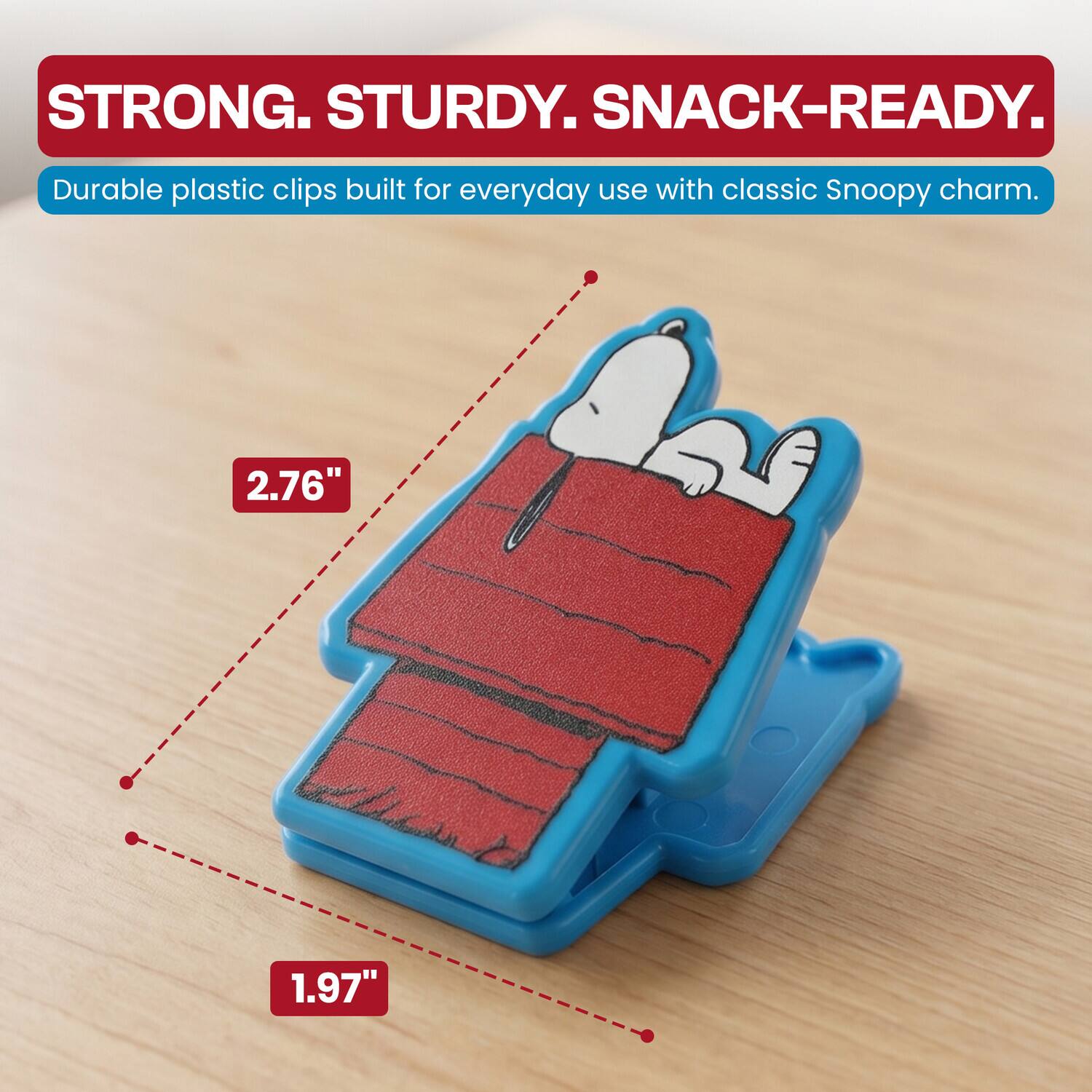 STRONG. STURDY. SNACK-READY.  
Durable plastic clips built for everyday use with classic Snoopy charm.  
2.76" 1.97"