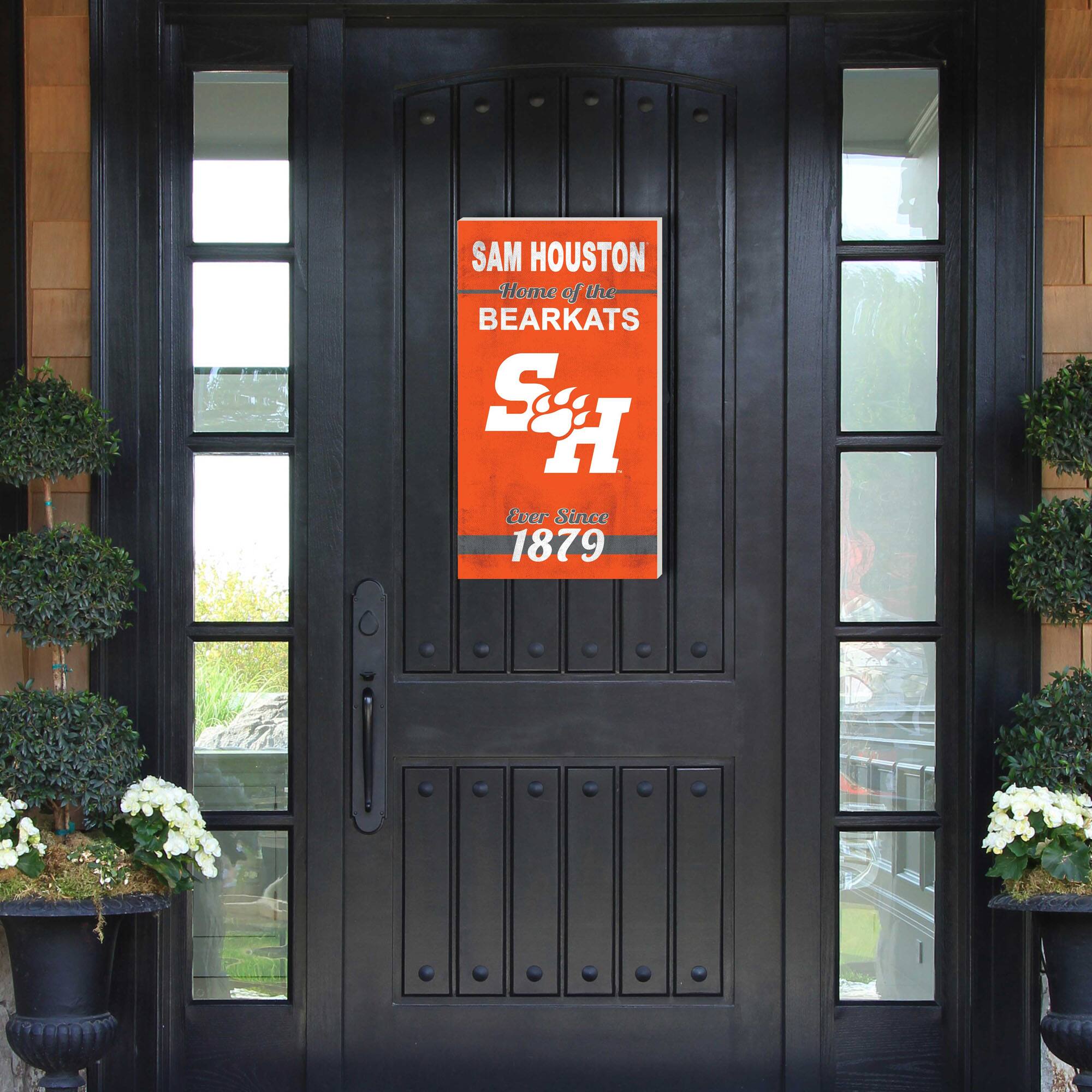 SAM HOUSTON  
Home of the BEARKATS  
S H  
Ever Since 1879