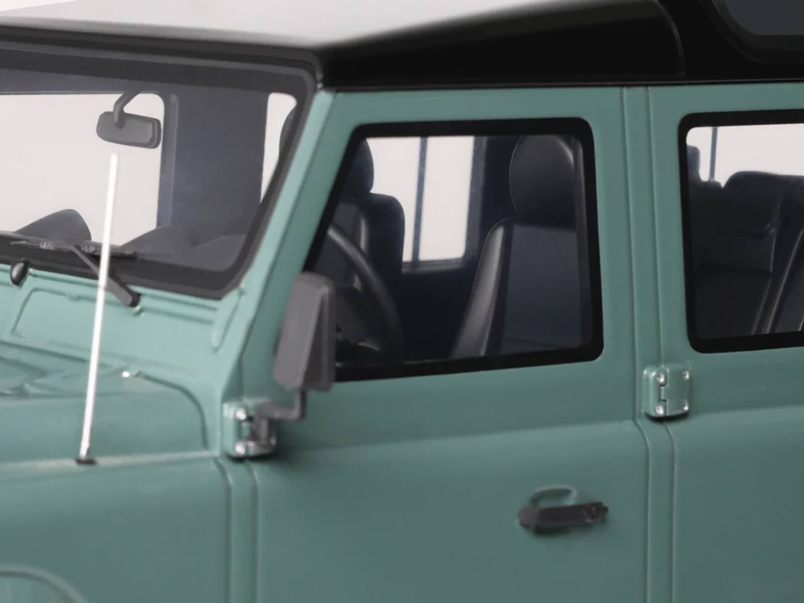 Alt View 2. GT Spirit - 2016 Land Rover Defender 3 Station Wagon Green with Black Top 1/18 Model Car by GT Spirit.