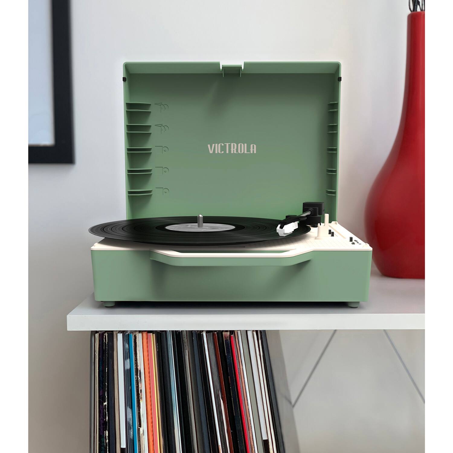 Alt View Zoom 25. Victrola - Re-Spin Sustainable Bluetooth Suitcase Record Player - Basil Green.