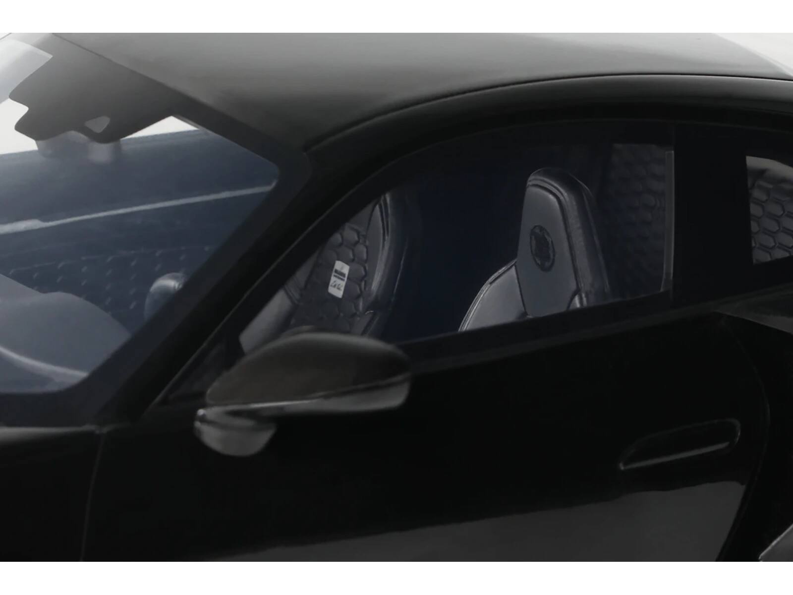 Left. GT Spirit - 2023 Brabus 900 Rocket-R Black model 1/18 Model Car by GT Spirit - Black.