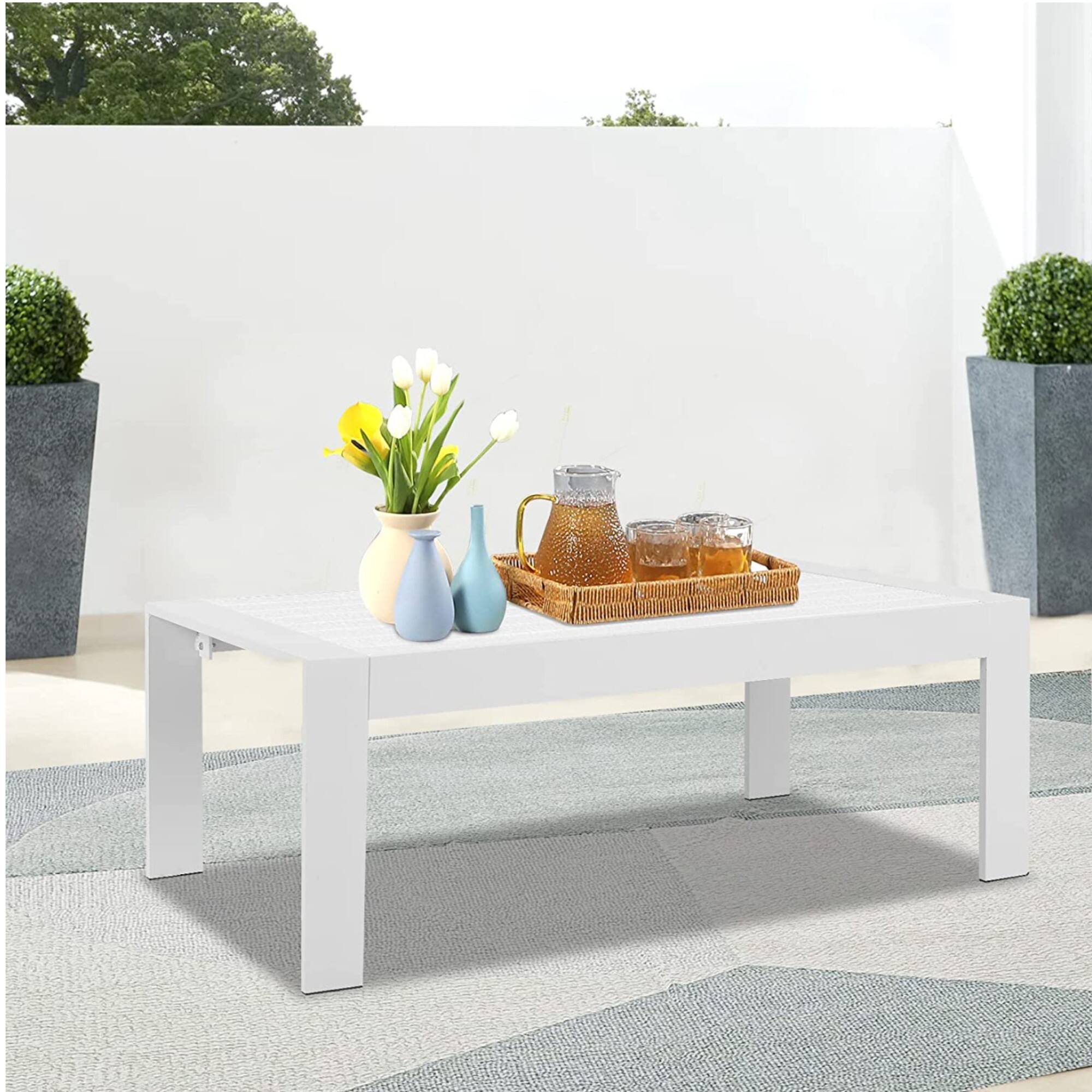 Left. Mondawe - 43" Aluminum Rectangle Patio Coffee Table - White.