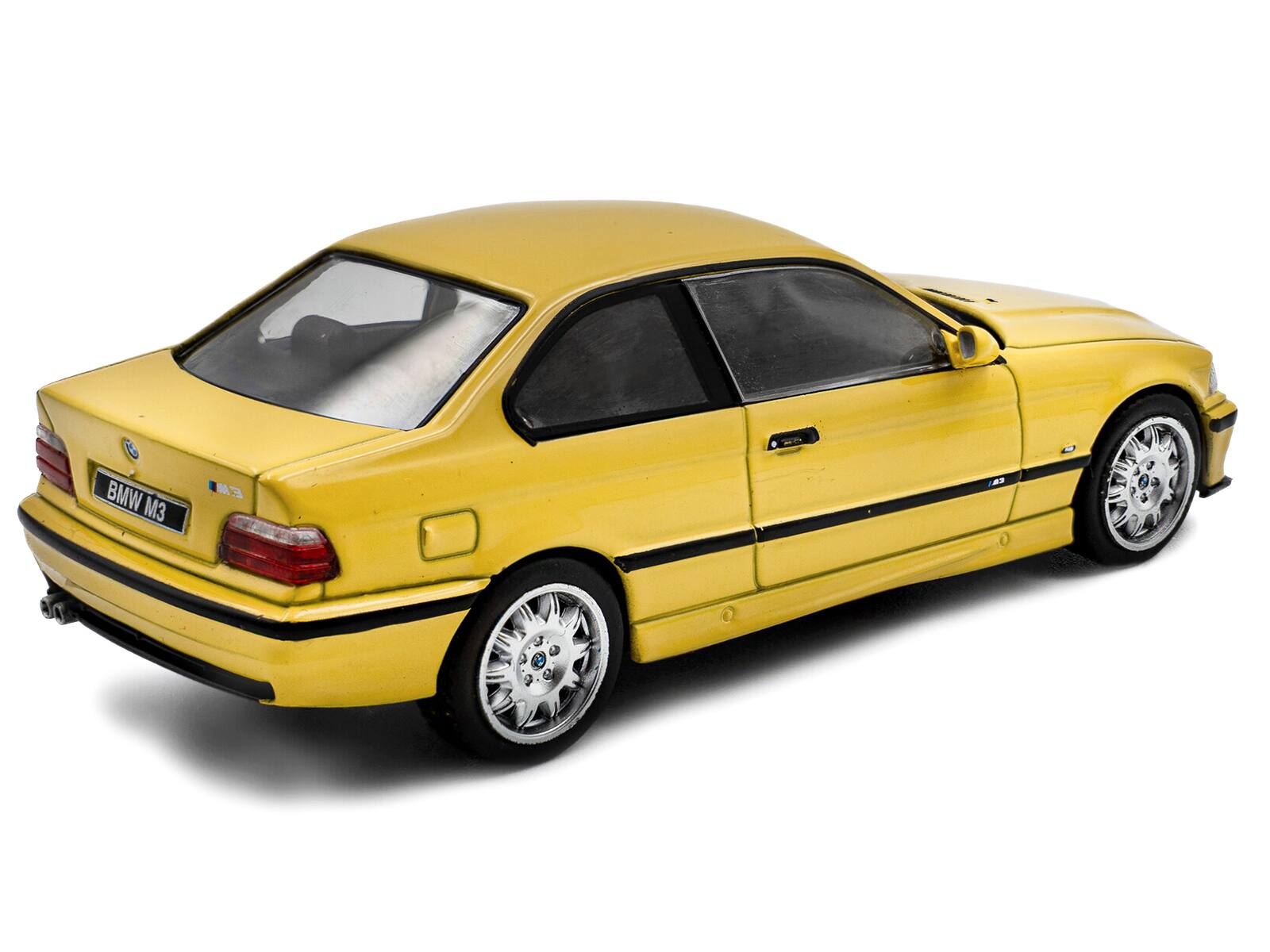 Left. Solido - 1999 BMW E36 M3 Coupe Dakar Yellow 1/43 Diecast Model Car by Solido - Yellow.