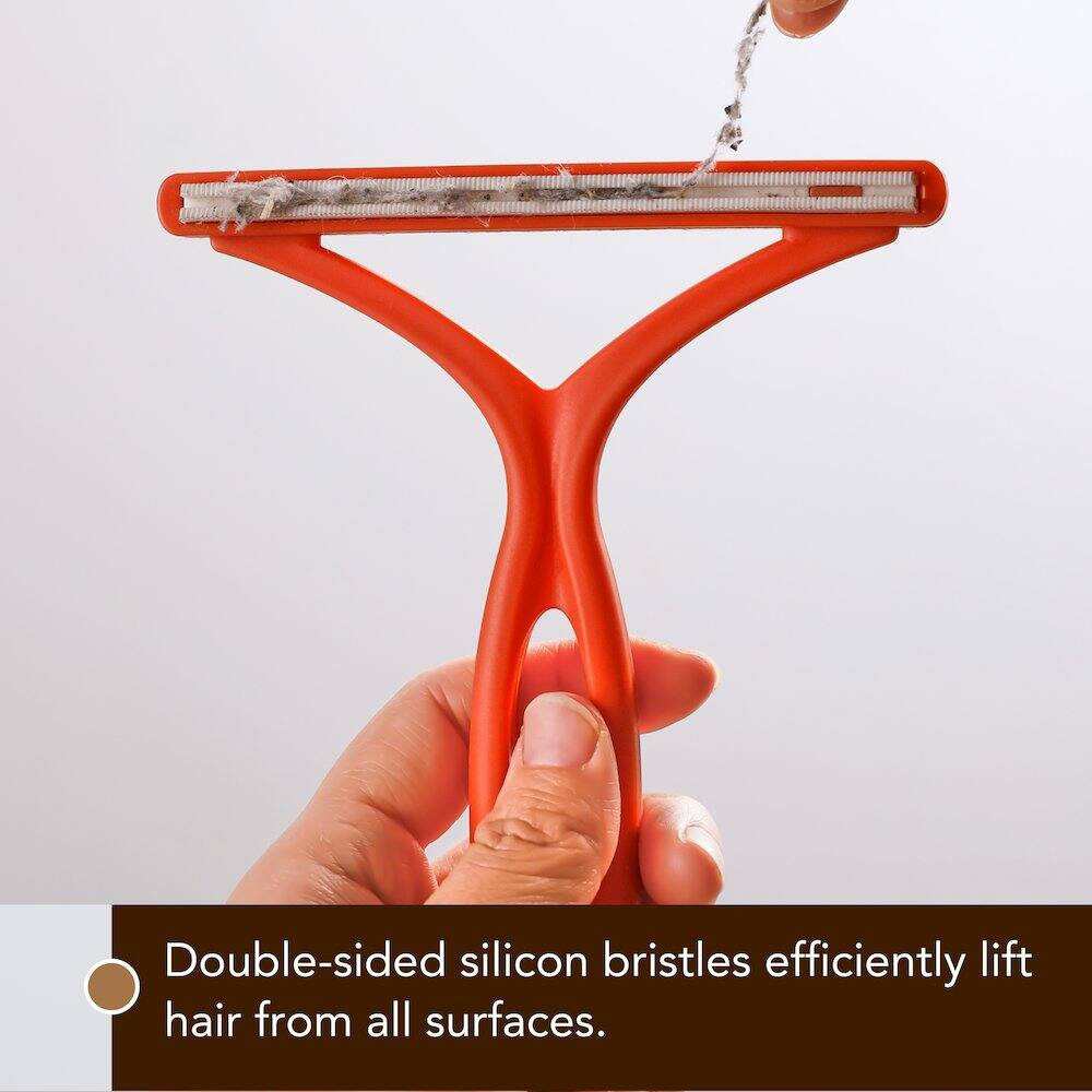 Double-sided silicon bristles efficiently lift hair from all surfaces.