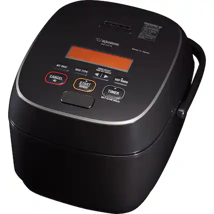 The image features a black rice cooker with a digital display. The display shows the time and temperature settings for the rice cooking process. The cooker is equipped with a timer and a reheat function, making it a convenient and versatile appliance for preparing rice. The image also includes a warning message, likely regarding the use of the appliance and ensuring safe operation.