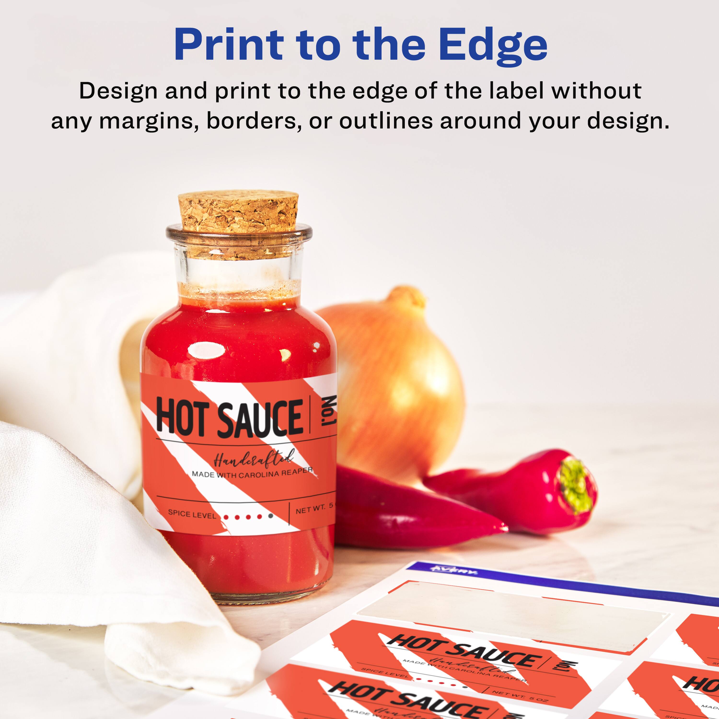 Print to the Edge

Design and print to the edge of the label without any margins, borders, or outlines around your design.

HOT SAUCE  
Hendstaftal  
REAPER  
MADE WITH CAROLINA REAPER  
SPICE LEVEL  
NET WT. 5 OZ
