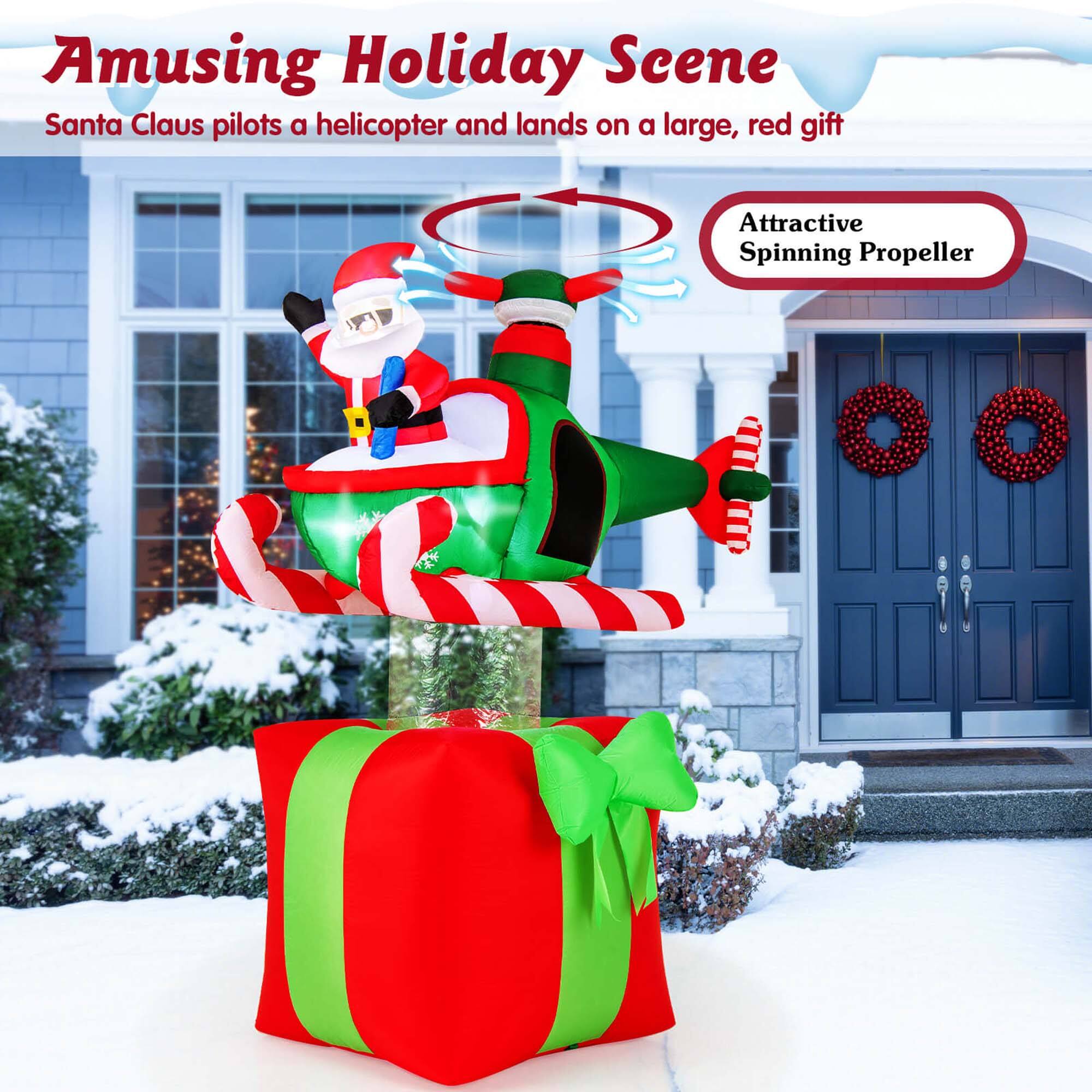 Amusing Holiday Scene  
Santa Claus pilots a helicopter and lands on a large, red gift  

Attractive Spinning Propeller