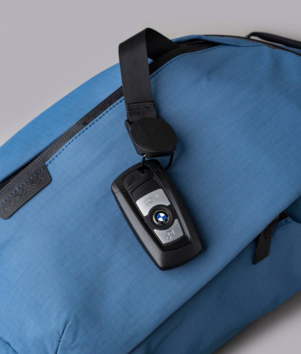 Alt View 4. ALPAKA - Crossbody Sling Bag 7.5L (Right Shoulder) for Men, Fits 11" Tablet, Phone Sleeve, Bottle Pocket, Luggage Pass-Through - Blue Axoflux 210D.