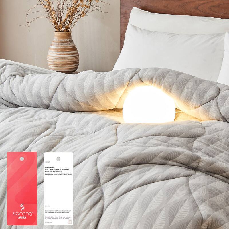 INSULATION WITH LIGHTWEIGHT WARMTH  
PARTIALLY PLANT-BASED POLYMER  

sorona AURA  

Sorona® is a partially plant-based fiber made from corn.  
See product label for complete fiber content.  
Incorporated to improve sleep:  
- Temperature regulation  
- Moisture management  
- Softness  

MADE IN CHINA
