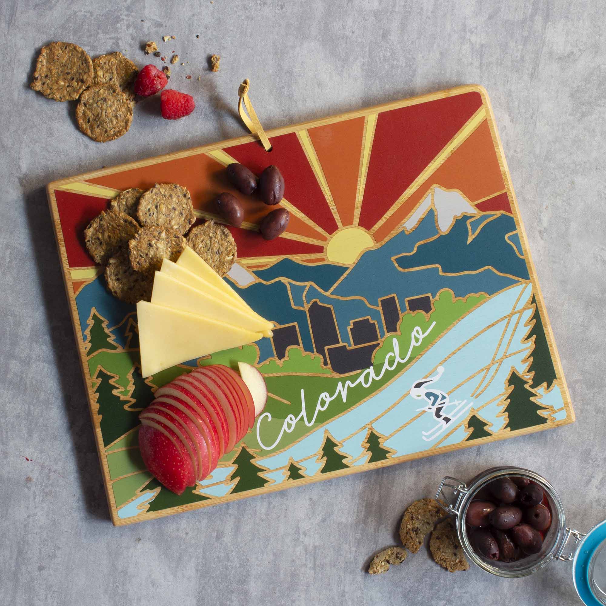 Angle. Totally Bamboo - Colorado Cutting Board with Artwork by Summer Stokes.