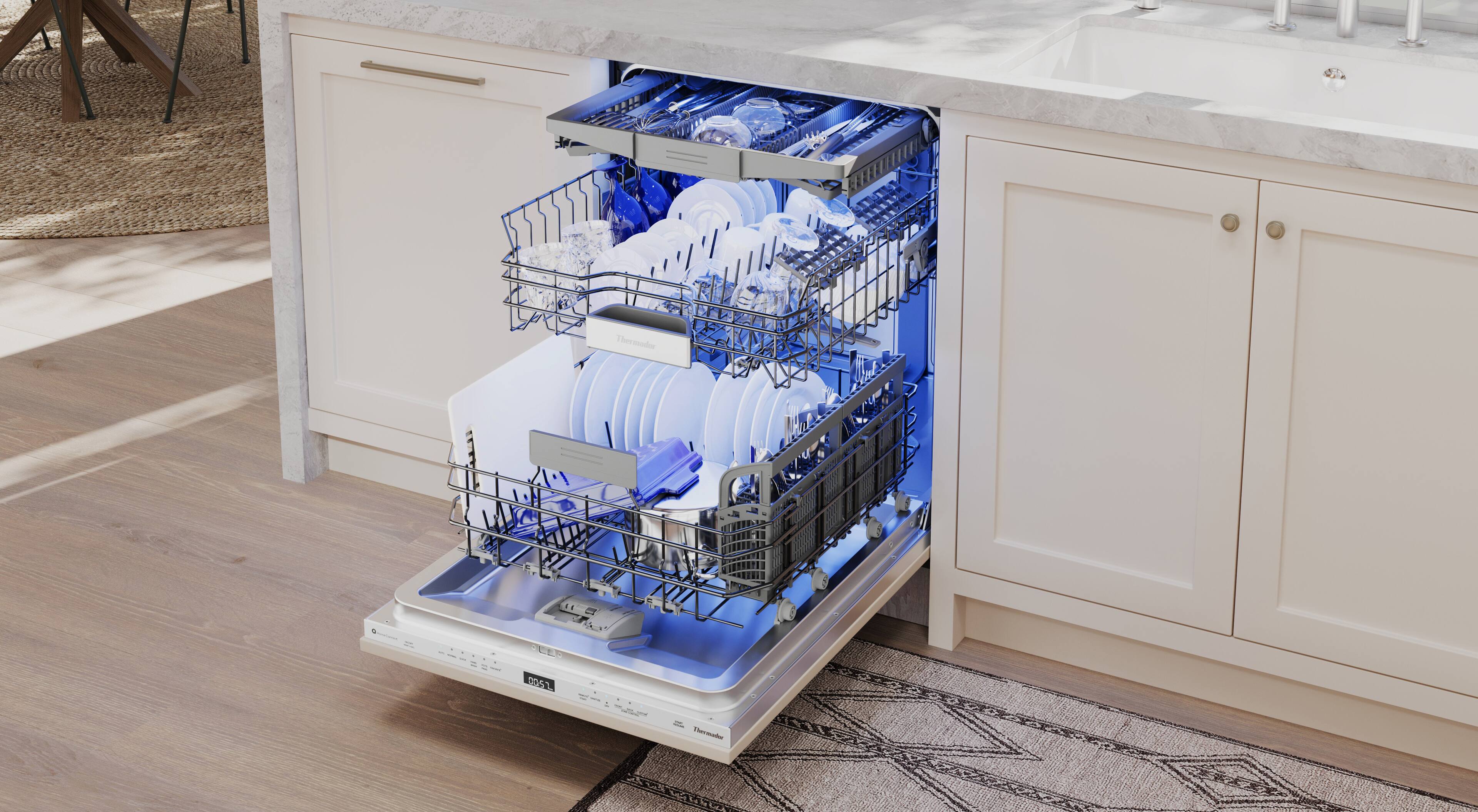 The image shows a dishwasher with a blue light inside, indicating that it is in use. The dishwasher is located under a countertop, and it is placed on a rug. The dishwasher is filled with dishes, and the light is illuminated, showing that the machine is actively cleaning the dishes.