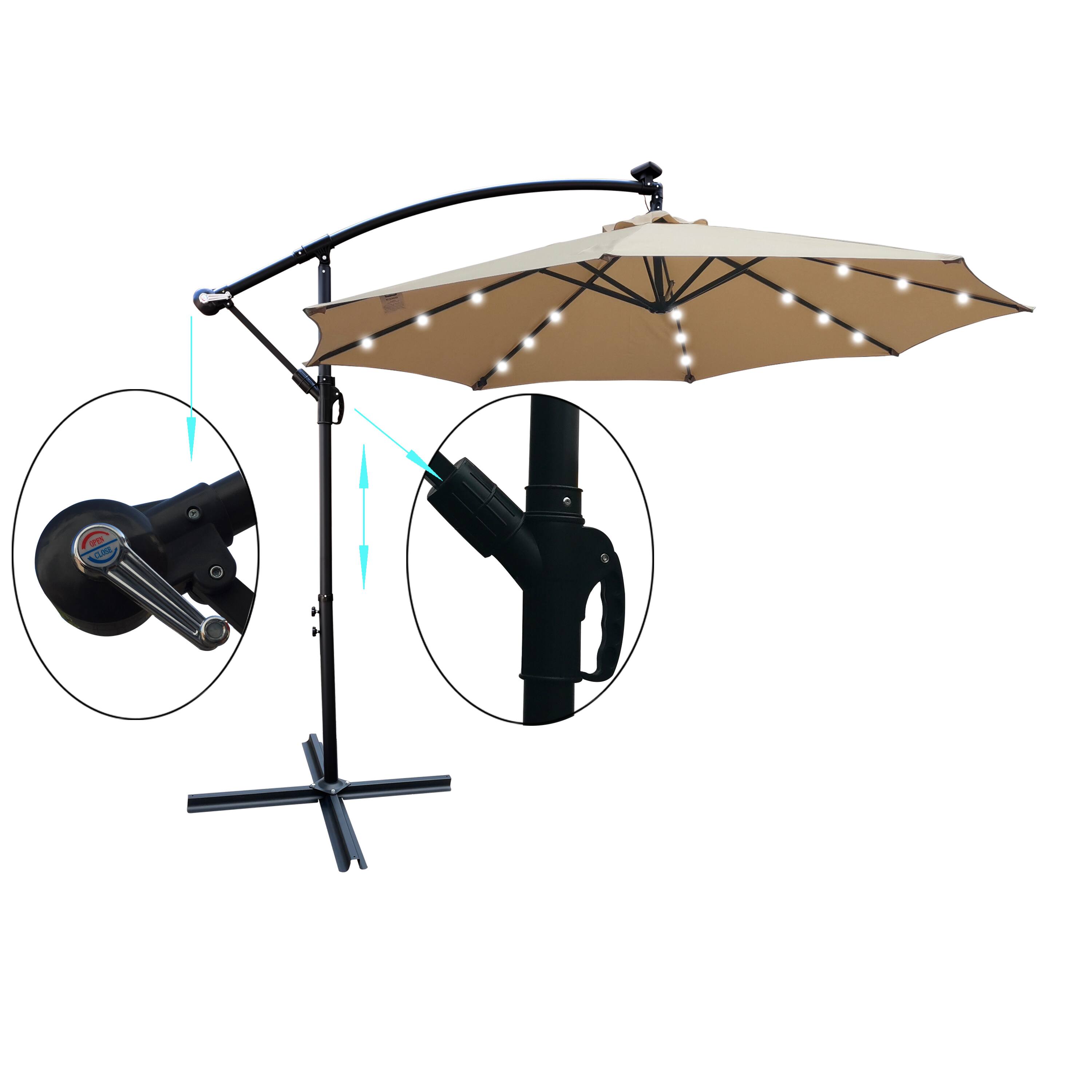 Left. Loheer - Loheer 10 ft Patio Umbrella Solar LED Outdoor Lighted Market Umbrella Tan with Crank Lift and Cross Base.