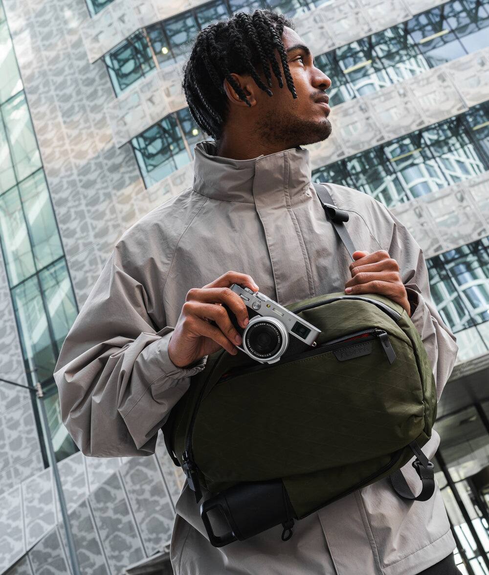 Alt View 10. ALPAKA - Crossbody Sling Bag 7.5L (Left Shoulder) for Men, Fits 11" Tablet, Phone Sleeve, Bottle Pocket, Luggage Pass-Through - Olive Green X-Pac X42.