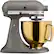 The text on the image reads: "Max wam 325 KitchenAid . - - Stir 246810 2 4 6 8 10 ARTISAN Kit CALTON Unpiuc ae rserting Suniiu srat."
Corrected text: "Max Wam 325 KitchenAid . - - Stir 246810 2 4 6 8 10 ARTISAN Kit CALTON Unpiuc ae rserting Suniiu srat."