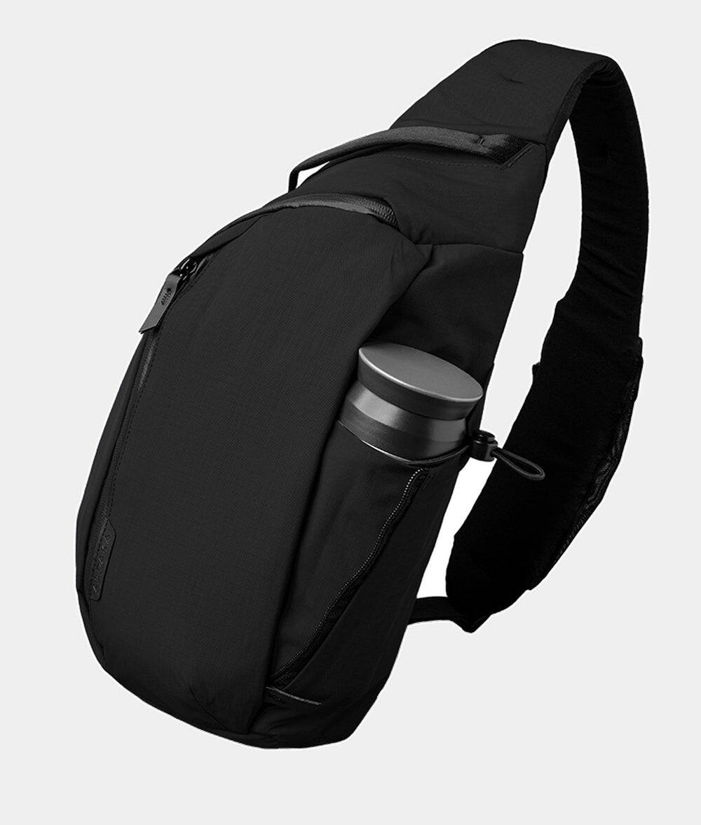 Front. ALPAKA - Metro Crossbody Right Shoulder Sling Bag Men,Sling Backpack - Fits 11" Tablet - Single Shoulder - Black Axoflux 210D.