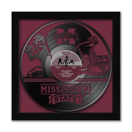 Sure, here is the corrected and grouped text from the image:
---
**MISSISSIPPI STATE**
**1985**
1. Conference Championship
2. Home Field: Davis Wade Stadium
3. Stadium Capacity: 60,311
4. Fight Song: "Mississippi State"
5. Mascot: "The Mississippi State Bulldogs"
**FIRST 25,000**
**1985**
**Conference Championship**
**Home Field: Davis Wade Stadium**
**Stadium Capacity: 60,311**
**Fight Song: "Mississippi State"**
**Mascot: "The Mississippi State Bulldogs"**
---
This text is organized to reflect the information presented in the image.