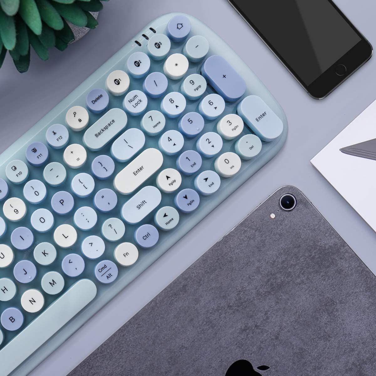 Sure, here is the corrected and grouped text from the image:

```
BT - B - IT
Delete Num Lock 8 A P - 7 Backspace Hame X F12 I 4 - - + F11 Il } I ] Enter F10 1 A { Pgup I [  0 = [ P  Shift 9 : O : Home ? I I L Ctrl > U K Fn < J Cmd . Ait M H N 9 Pgup 6 A 5 2 A 1 End End PDn + 3 PgDn 0 I Enter Del B
```

Grouped and corrected:

```
BT - B - IT
Delete Num Lock 8 9 7 6 5 4 3 2 1 0
Backspace Home End PgDn PgUp
F12 F11 F10
Enter
Shift
Ctrl
Fn
Cmd
Alt
PgUp PgDn Home End
```