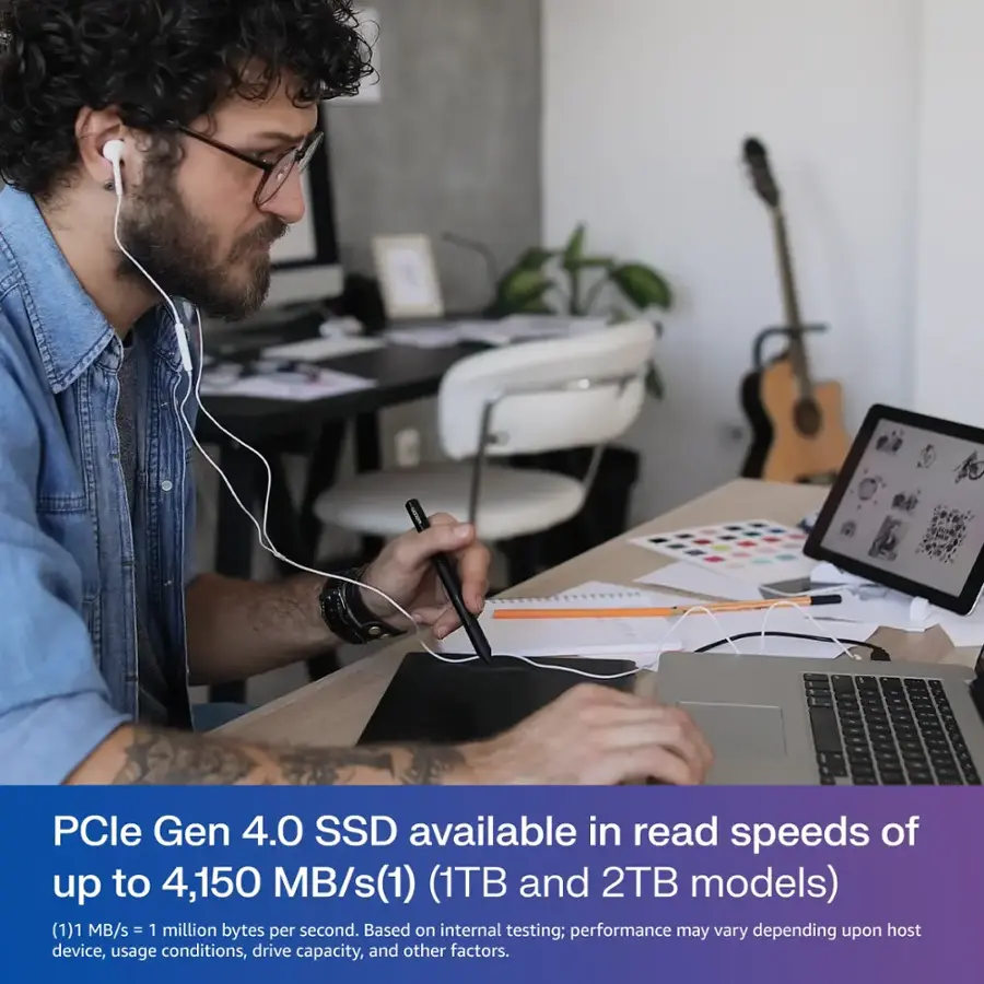 The image features a man wearing headphones and using a laptop. The laptop is connected to a PCle Gen 4.0 SSD, which offers read speeds of up to 4,150 MB/s. This SSD is available in 1TB and 2TB models. The man is also using a pen and paper, possibly taking notes or working on a project. The scene takes place in an office setting, with a chair and a potted plant visible in the background.