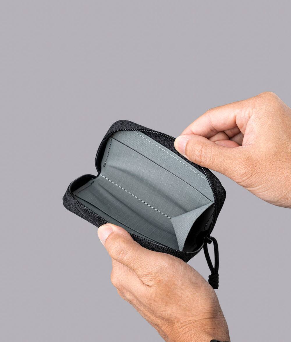 Alt View 1. ALPAKA - Zip Coin Wallet with RFID Protection, Water-Resistant Compact Card & Coin Holder - Black Axogrid 210D.