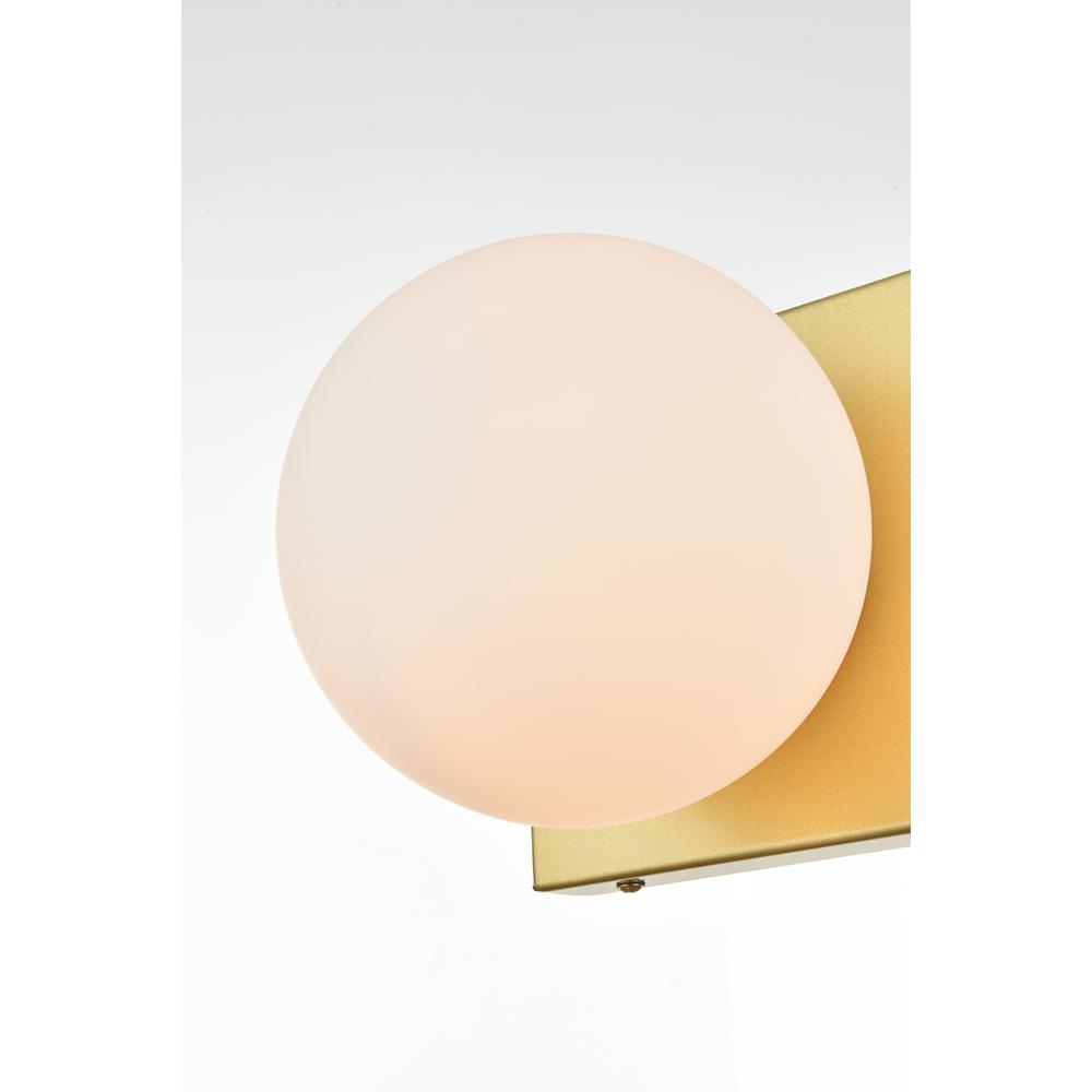 Left. Living District - Jaylin 1 light Brass and frosted white Bath Sconce - Brass And Frosted White.