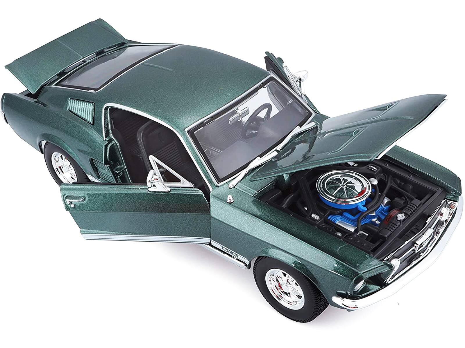 Alt View 1. Maisto - 1967 Ford Mustang GTA Fastback Green Metallic with White Stripes 1/18 Diecast Model Car by Maisto.