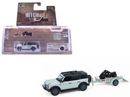 2021 Ford Bronco 4-Door Badlands Cactus Gray with Black Top and Motorcycle with Trailer 1/64 Model Cars by Greenlight