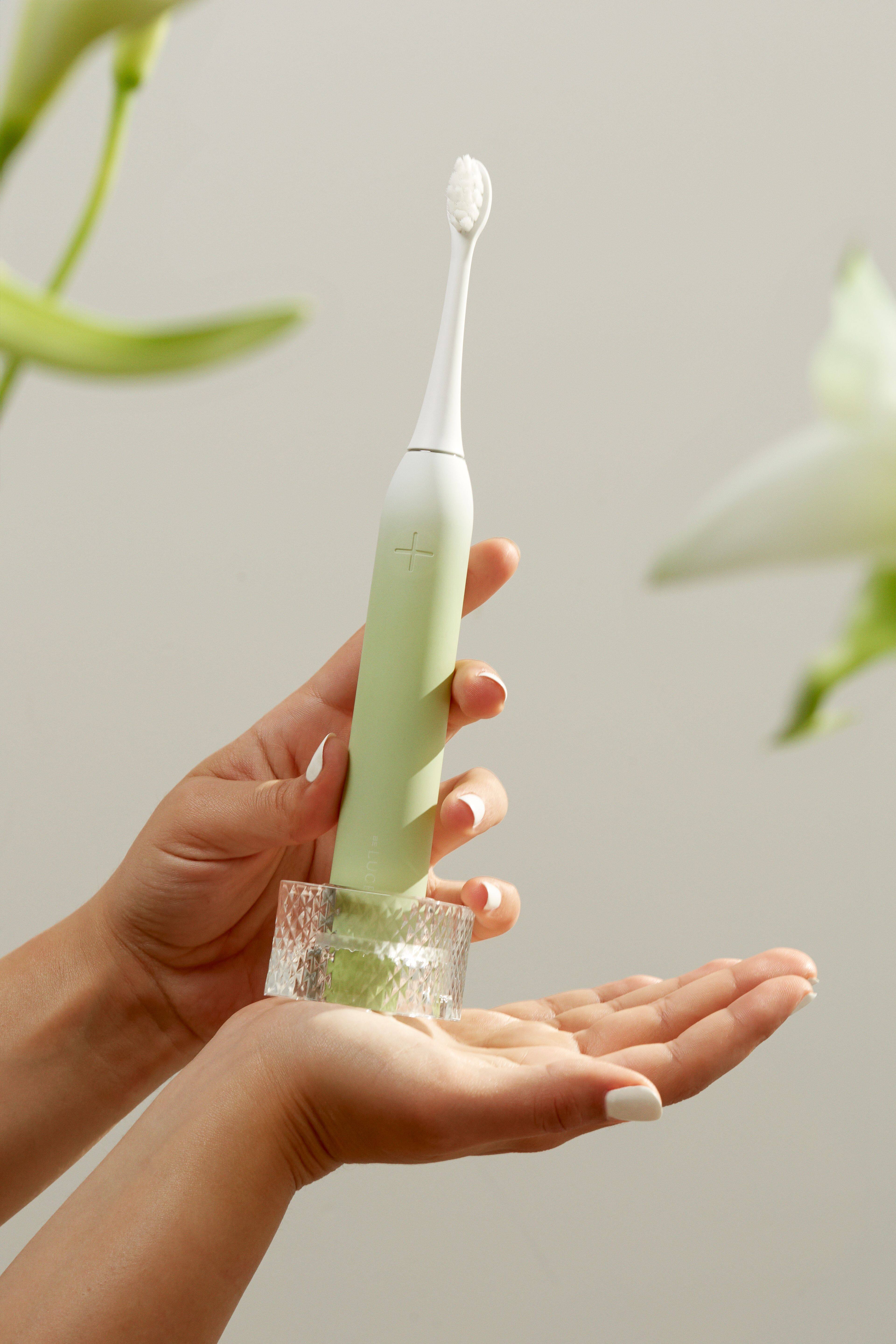 Angle. Be Lucent - Sonic Electric Toothbrush that look cosmetically appealing with 3 brush modes.  Last up to 60 days before charging. - Mint.