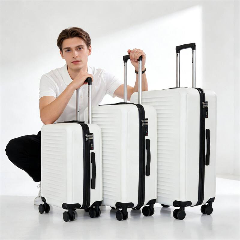Angle. HTUTWOO - Luggage 3-Piece Set (20/24/28) - ABS Hardshell Suitcase, 360° Silent Spinner Wheels, Combination Lock, Ultra Lightweight - White.