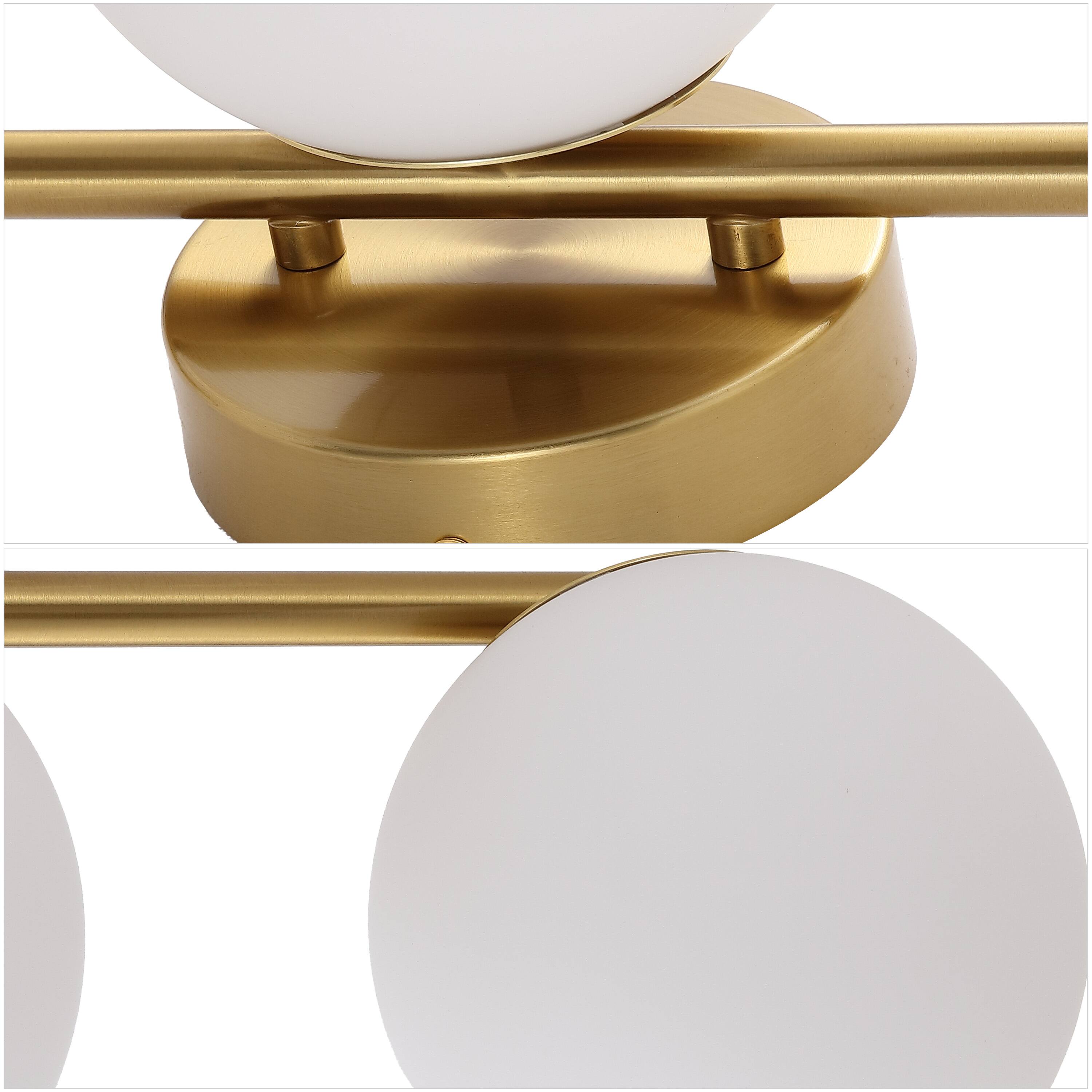 Alt View 4. Jonathan Y - Nash 23" Mid-Century Modern Brass Gold 3-Light Metal Vanity Light with White Glass Globe Shades Wall Sconce - Brass Gold.