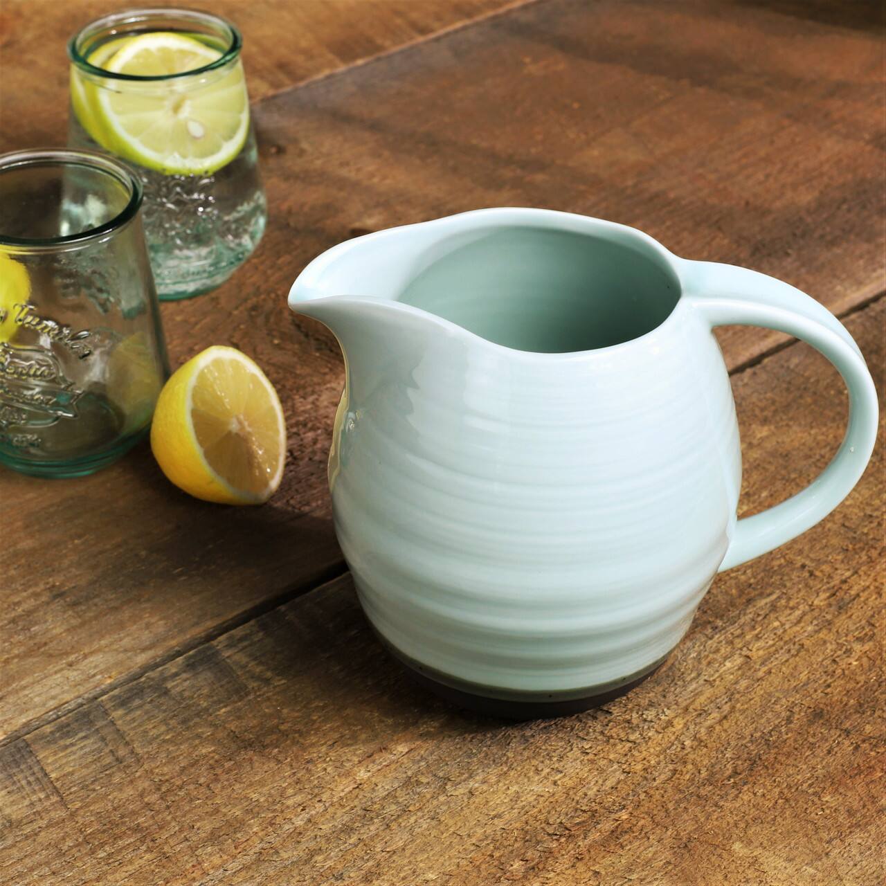 Angle. Euro Ceramica Home - Diana Professional Grade Porcelain Pitcher - 54 oz - Tint.