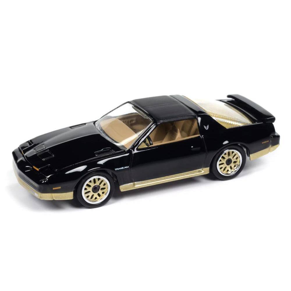 Angle. Johnny Lightning - 1986 Pontiac Firebird T/A Black with Champagne Gold Accents "Muscle Cars USA" Series 1/64 - Black with Champagne Gold.