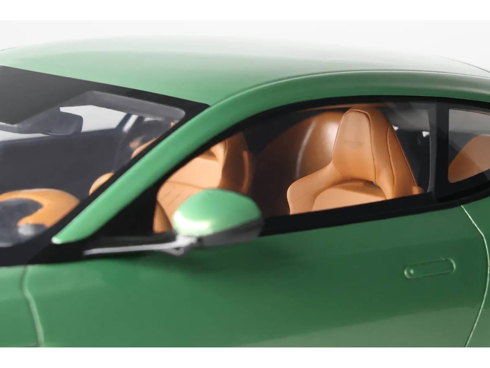 Left. GT Spirit - 2023 Aston Martin DB12 Green Metallic 1/18 Model Car by GT Spirit - Green Metallic.