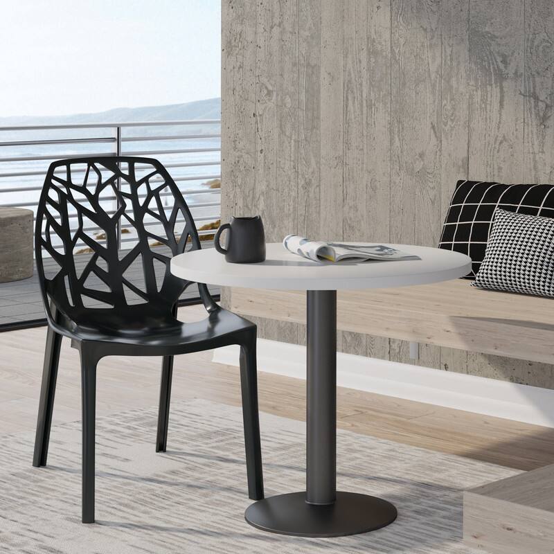 Angle. LeisureMod - Cornelia Modern Stackable Accent Dining Chair with Cut Out Backrest Design for Dining Rooms or Patios - Solid Black.